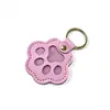 Colgante Creativo de Cuero con Forma de Pata Hebilla Conmemorativa para Mascotas Almacenamiento de Pelo de Gato y Perro Adorno de Foto de Mascota Colgante Lindo de PU