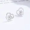 Preciosos pendientes de botón para mujer plata de ley 925 nuevo diseño de nicho con forma de corazón arete de cartílago de moda personalidad temperamento joyería de oído ins