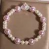 Novo Bracelete Pérola Rosa Rosa Estilo Chinês para Mulheres, Luxo Acessível de Nicho, Exquisito e de Alta Qualidade Moda Zircônia Bracelete Saturno