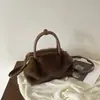 Bolsa de Mão de Pelúcia de Cor Sólida de Alto Valor Nova Chegada Outono 2026 Bolsa de Ombro Único Moda Fofa para o Dia a Dia Bolsa Transversal Tendência