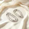 Pendientes de Acero Inoxidable con Forma Geométrica Ovalada Hueca Irregular Estilo Barroco Retro High-End Sencillos Tachuelas Venta al por Mayor