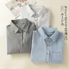 Foto real de la nueva camisa rayada de algodón y lino de manga larga de estilo artístico 2026, top casual holgado de talla grande