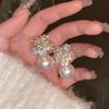 Pendientes de copo de nieve de perla con incrustaciones completas de diamantes, aguja de plata 925, diseño exclusivo, pendientes de alta gama, pendientes retro de lujo ligero