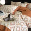 Juego de cuatro piezas simple y de alta gama 100% algodón puro engrosado cepillado, ropa de cama cálida para otoño e invierno estilo botón, impresión digital 100% algodón