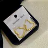 Aretes Geométricos Asimétricos Martillados de Acero Inoxidable de Venta Caliente Transfronteriza Aretes de Presión de Aceite Simples y Versátiles Chapados en Oro de 18K
