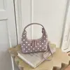Bolsa de mão pequena requintada de Shuai Mi, nova coleção de outono de 2026, bolsa transversal feminina, bolsa tote de bolinhas de nicho, bolsa quadrada pequena