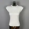 Ropa de Mujer de Comercio Exterior Coreana Dongdaemun Nueva Moda Cuello Redondo Color Sólido Versátil Delgado Sexy Suéter sin Mangas Top de Punto