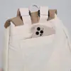 Al por mayor 2026 Nueva Mochila para Estudiantes de Secundaria Versátil Casual Moda Mochila Color Bloque Letra Cierre de Cordón Bolso de Hombro Doble para Mujer