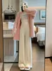 Nova coleção de outono e inverno estilo coreano: Calças pantalona de alta qualidade, com corte solto, macias e confortáveis para mulheres, apresentando um design relaxado e fluido com malha no comprimento do chão