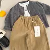Suéter Infantil 2026 Otoño Nuevo Producto para Niños y Niñas, Suéter de Punto Trenzado Color Sólido, Cárdigan de Punto con Cuello Redondo para Bebé