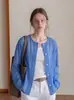 Jaqueta camisa feminina estilo francês 2026 verão nova fina camada externa transparente saída de praia proteção solar cardigã camisa de ar condicionado top