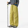 Calça de trabalho casual estilo americano oversized para homens, adequada para primavera e outono, moderna, versátil, esportiva, à prova de vento, à prova d'água e calça longa de perna reta