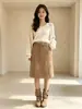 Elegante y sofisticada falda midi de ante en línea A para mujer, nueva colección otoño 2026, estilo europeo, de cintura alta, favorecedora, moderna