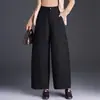 Pantalones anchos de jacquard estilo chino para mujer, nueva colección otoño 2026, con una caída favorecedora, efecto adelgazante, cintura alta y un corte relajado de tres cuartos.