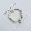 Pulsera de Cerámica Jingdezhen Nueva Historieta China Pulsera Boutique Venta al por Mayor Estudiante Joker Explosiones Puesto del Mercado Nocturno Pulsera