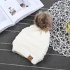 Gorro de lana para padres e hijos europeo y americano con pompón y forro de terciopelo, gorro de punto cálido, gorro de moda, venta al por mayor directa de fábrica