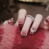 Armadura de mano sentido avanzado hecho a mano ins explosiones diamante roto mariposa uña piezas de uña al por mayor uñas portátiles