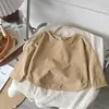 Camiseta de Manga Larga para Niños Primavera/Verano 2026, Corte Holgado Estilo Coreano, Camiseta Base de Color Caramelo para Niños y Niñas, Top de Color Sólido