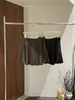 [Kaipu] Falda Corta de Otoño Francesa de Trece Líneas con Gamuza Nebulosa, Abertura y Corte Diagonal, Falda de Moda para Mujer BQA6178
