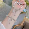 Nuevo Pulsera de Gato Ojo de Gato de Jade Hetian con Mariposas para Mujer, Popular en Xiaohongshu, Exquisita y Elegante, Regalo Fresco y Único