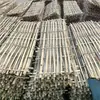 Estructura de estera de bambú andamio de bambú sitio de construcción de particiones colocación de láminas base de valla de bambú capa base valla de construcción de ingeniería bambú moso