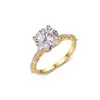 Anillo Redondo Grande de Moissanita en Plata S925 con Piedras Laterales en Forma de Lágrima Incrustadas en Oro, un Artículo Popular en Ebay para Mujeres