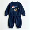 Conjunto de sudadera de comercio exterior transfronterizo para niños, estilo europeo y americano, nuevo conjunto deportivo casual de otoño e invierno con sudadera y pantalones de chándal, estilo coreano