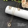Conjunto de pendientes y collar Xuping estilo vintage de nicho europeo y americano transfronterizo, conjunto de joyería elegante de aleación de cobre, venta al por mayor y hecho a medida
