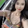 Colección Larga de Collares Superpuestos de Perlas Swarovski para Mujer, Estilo Lujo Ligero, Cadena Versátil para Suéter con un Toque de Alta Gama, Venta al por Mayor Otoño e Invierno