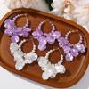 Pendientes largos de estilo Chanel de un solo canal, lujo ligero, elegantes, combinan con todo, perla artificial brillante, color púrpura, pétalos multicapa, pendientes para mujer