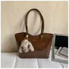 Bolsa de Alta Qualidade com Textura e Grande Capacidade 2026 Nova Moda para o Dia a Dia Feminina Bolsa de Ombro Bolsa Tote de Mão Primavera e Verão