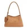 Nova coleção outono/inverno: bolsa de camurça elegante e luxuosa com pingente, compartimento e fecho de zíper, projetada para qualidade de exportação