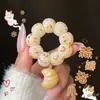 Pulseira Natural Torcida à Mão com Raiz de Bodhi Queimada em Carvão Garra de Gato Alho Mangostão Semente de Bodhi Contas de Buda Rosário Atacado