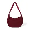Bolso bandolera de gran capacidad para mujer, nuevo modelo 2026, bolso de hombro, mochila deportiva versátil, bolsa tipo albóndiga de color sólido para almacenamiento