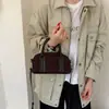 Bolso de mano retro estilo Boston con forma de concha para mujer, nueva colección 2025, moda transfronteriza de tendencia, bolso de hombro de gamuza