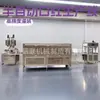 Máquina llenadora de lápiz labial Guangzhou Huilian de 12 orificios, mezcladora de calentamiento automático, línea de producción de llenado de lápiz labial
