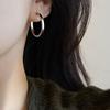 Aretes de anillo de diamantes de alta gama de lujo ligero nicho aretes exagerados aretes grandes mujeres viento frío joyería de moda al por mayor