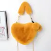Bolso de mano transfronterizo con forma de corazón de felpa, bolso de hombro y bandolera para mujer, bolso de cadena de piel sintética de conejo, bolso lindo con forma de corazón, modelo nuevo