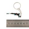 Varolant periférico intrépido contrato Mini llavero de pistola pequeña amuleto fantasma ala vacía geométrico Lingyun Cielo vertical 5cm