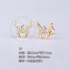 Pendientes de acero de titanio 316L chapados en oro con microincrustaciones de circonio y forma de libélula con forma de mariposa y perforación transfronteriza.