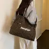 Bolso tote nuevo de moda con estampado de leopardo 2026, un bolso de mano versátil y elegante que se puede llevar en la mano o colgar debajo del brazo, un bolso de hombro de nicho para mujer