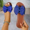 Sandalias Planas con Lazo Grande Transfronterizas para Mujer 2026 Verano Nuevas Estilo Europeo y Americano Punta Redonda Deslizables Venta al por Mayor