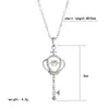 Collar con colgante dinámico de llave hueca romántica europeo y americano para mujer, microincrustado con diamantes, cadena de clavícula de nicho de lujo ligero, regalo para el Festival Qixi