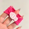 Modernas y coloridas nuevas ligas para el cabello 2026, accesorios versátiles para el cabello inspirados en la dopamina para niños, diademas de alta gama con temática de dulces M&M