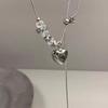 Collar de corazón de acero de titanio, collar de doble capa de cristal tirado a mano, dulce y genial, collar de diseño de nicho de cadena de clavícula personalizada que combina con todo para mujer