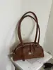 Bolsa de mão versátil de alta qualidade para mulheres, nova moda 2026, bolsa de ombro requintada, estilo coreano, bolsa de bowling de nicho