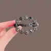 Coreano nuevo pedrería hueco ovalado perla pinza para el cabello borde de girasol pinza para el cabello adorno para la cabeza pinza de resorte accesorios para el cabello pinza superior en stock