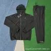 Traje de Otoño e Invierno 2025 Nuevo Pantalones de Seda Helada de Secado Rápido Chaqueta Deportiva Casual con Cremallera y Capucha Ropa de Protección Solar para Hombres y Mujeres Tendencia