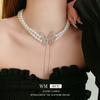 Collar de doble capa con borlas de mariposa y diamantes, con perlas, cadena de clavícula de nicho de moda, pendientes ligeros de lujo con temperamento, venta al por mayor de fábrica