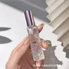 Botella de perfume de vidrio de 10 ml, botella recargable de alta gama, botella rociadora de melón amargo, botella de perfume de oro rosa con tapa de rosca de presión, botella vacía